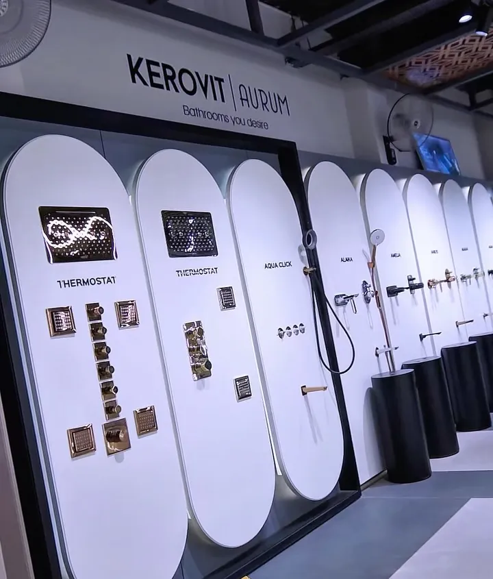Rows of arched display panels with taps and mixers