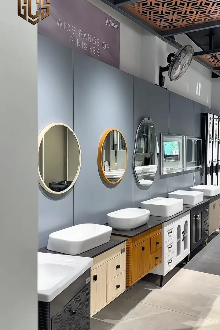 Showroom corridor with round mirrors and vanity units
